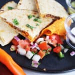 Doritos Quesadilla on plate with toppings